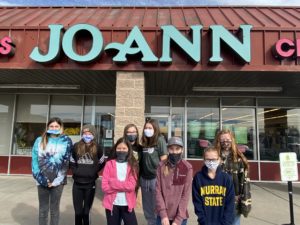 4-H participants in front of JoAnn Fabrics