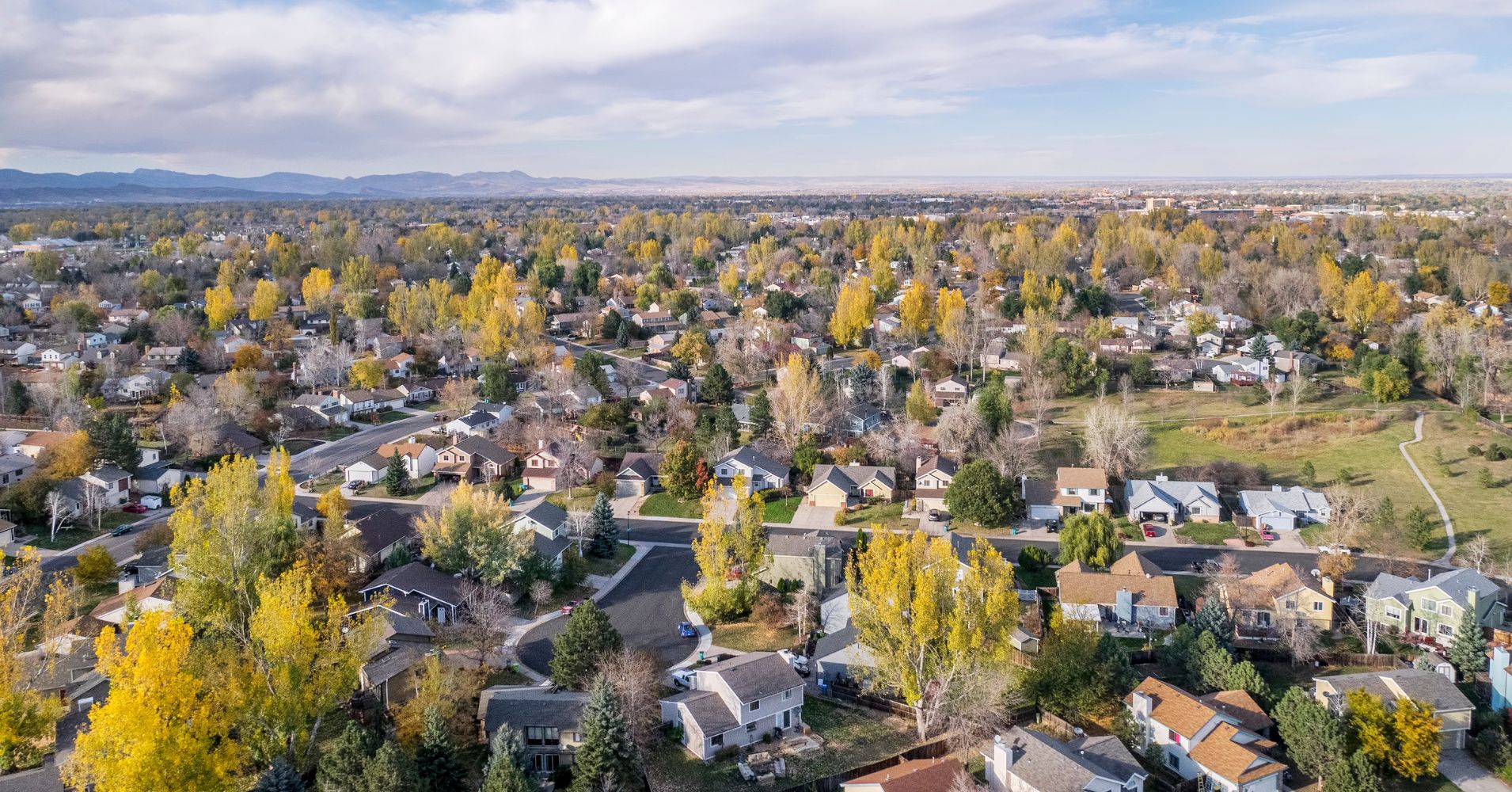 Aerial photograph of houses and fall color