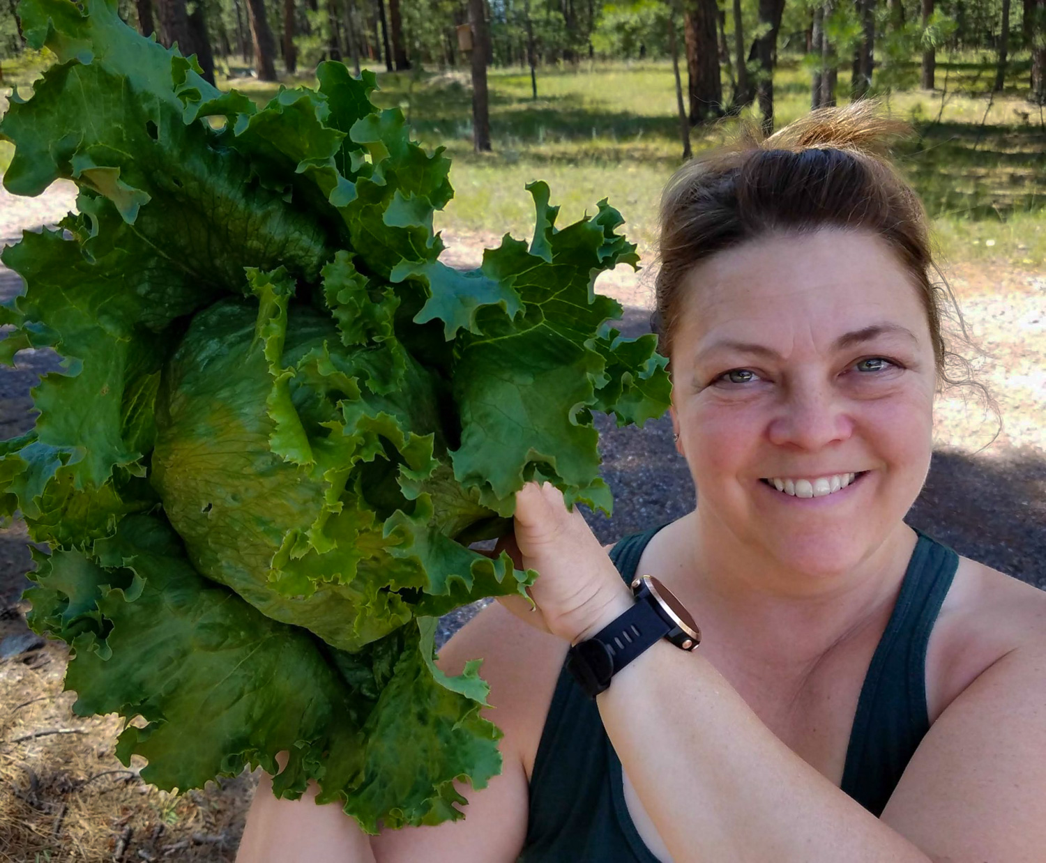 Michele Ritchie holds a head of lettuce
